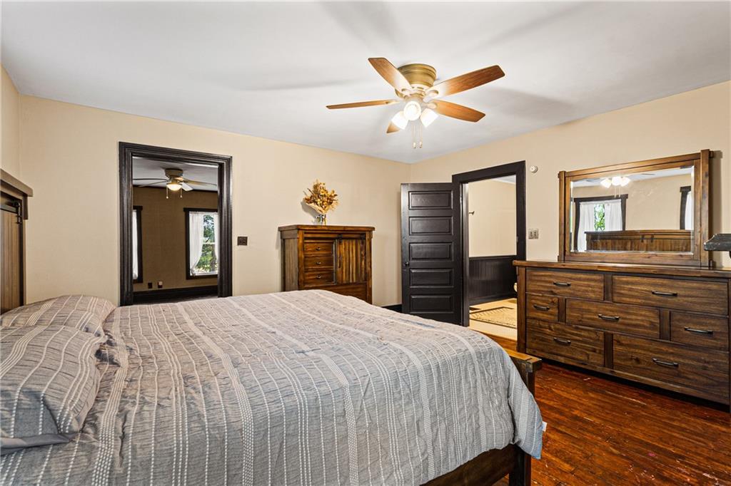 580 Green Valley Road Eighty Four, PA 15330 - Photo 36 of 45 a bedroom with a bed and wooden floor