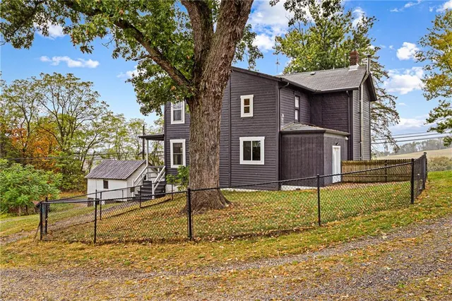 a view of swimming pool with patio