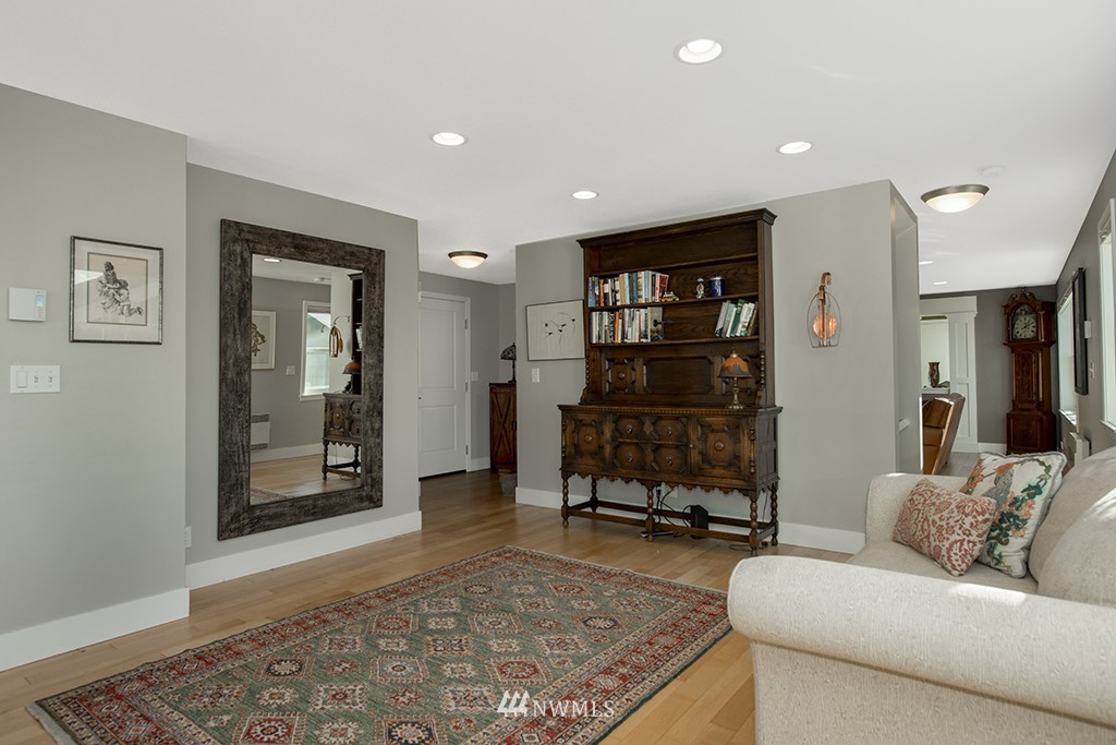 710 West Howe Street Seattle, WA 98119 - Photo 15 of 40 a living room with furniture and a rug