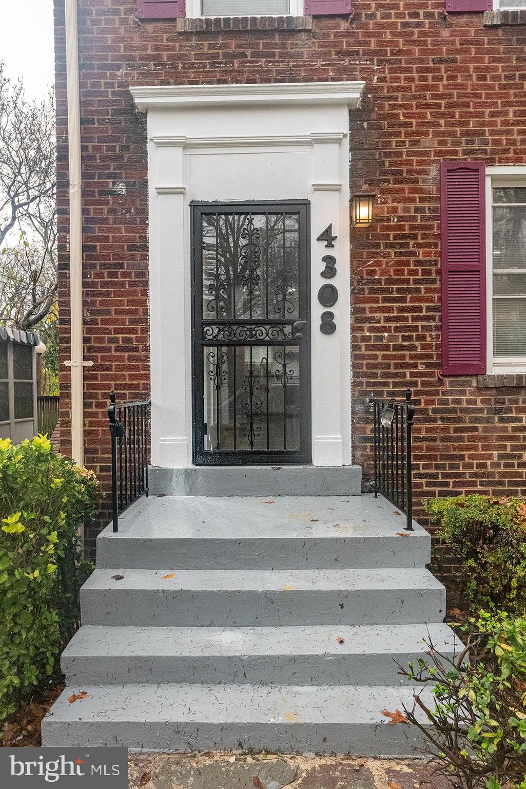 4308 Alabama Avenue Southeast Washington, DC 20019 - Photo 2 of 47 a front view of a house with stairs