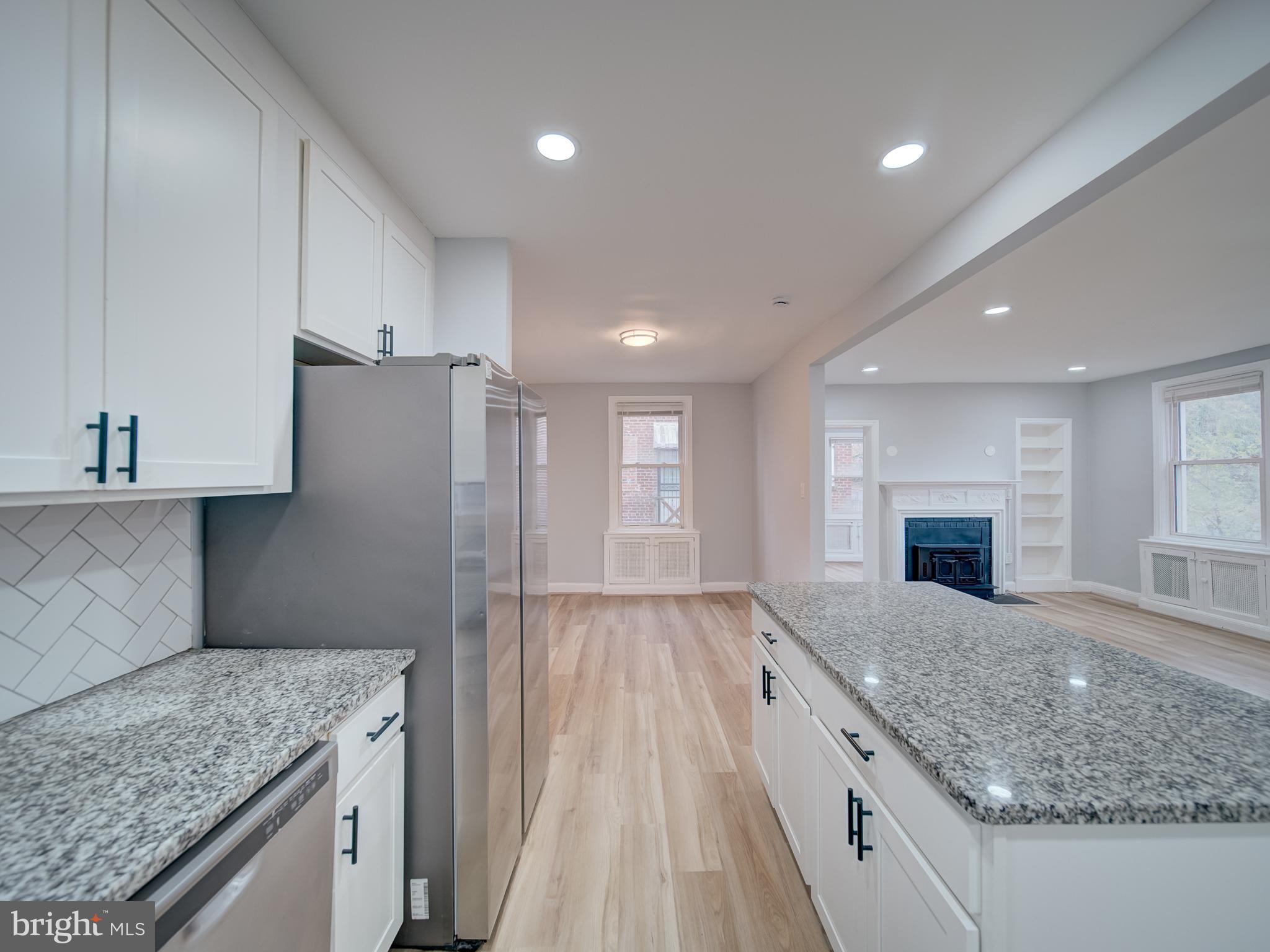 4308 Alabama Avenue Southeast Washington, DC 20019 - Photo 21 of 47 a kitchen with a sink stove and refrigerator