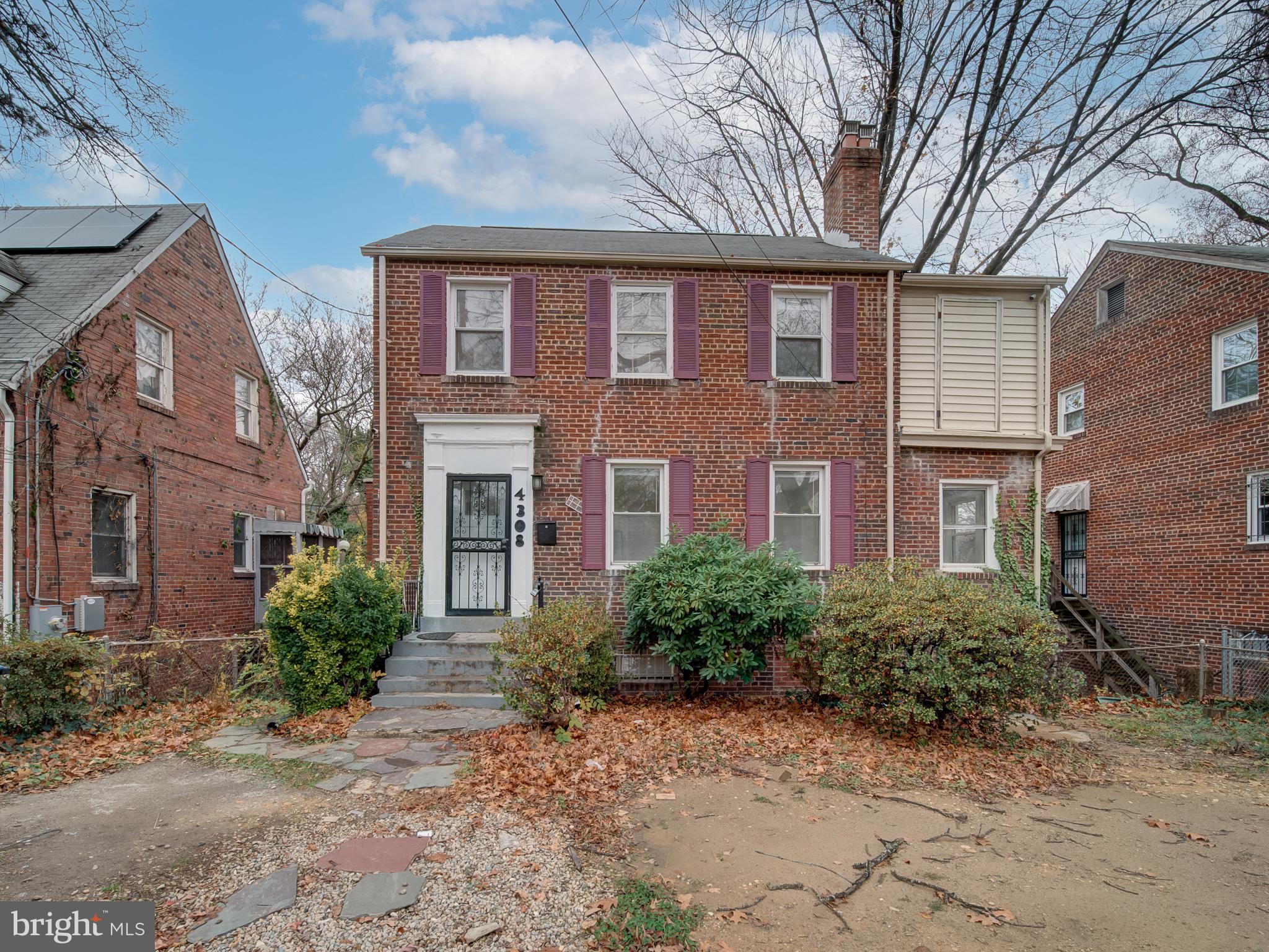 4308 Alabama Avenue Southeast Washington, DC 20019 - Photo 8 of 47 a front view of a house with garden