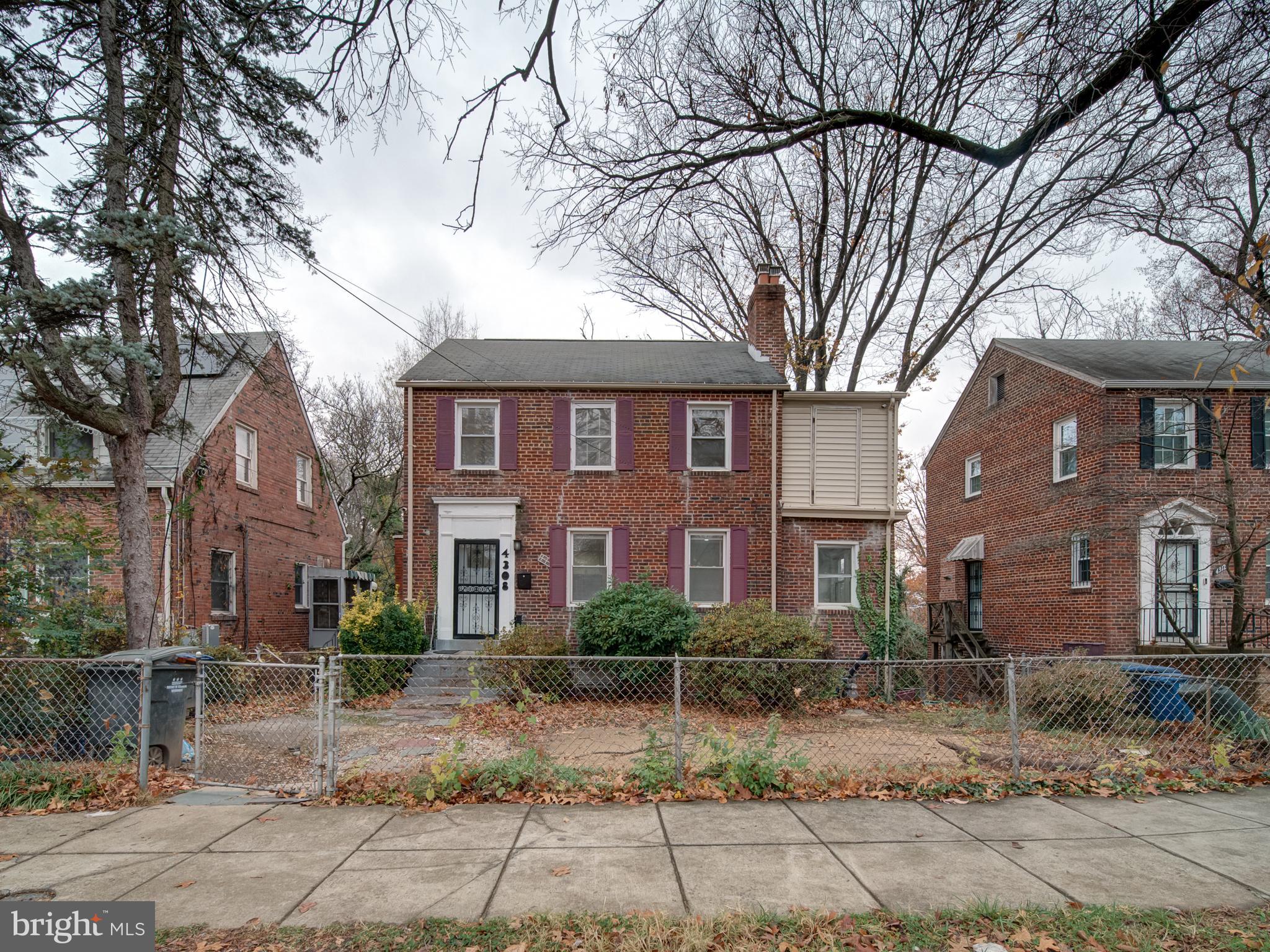 4308 Alabama Avenue Southeast Washington, DC 20019 - Photo 9 of 47 a front view of a house with garden