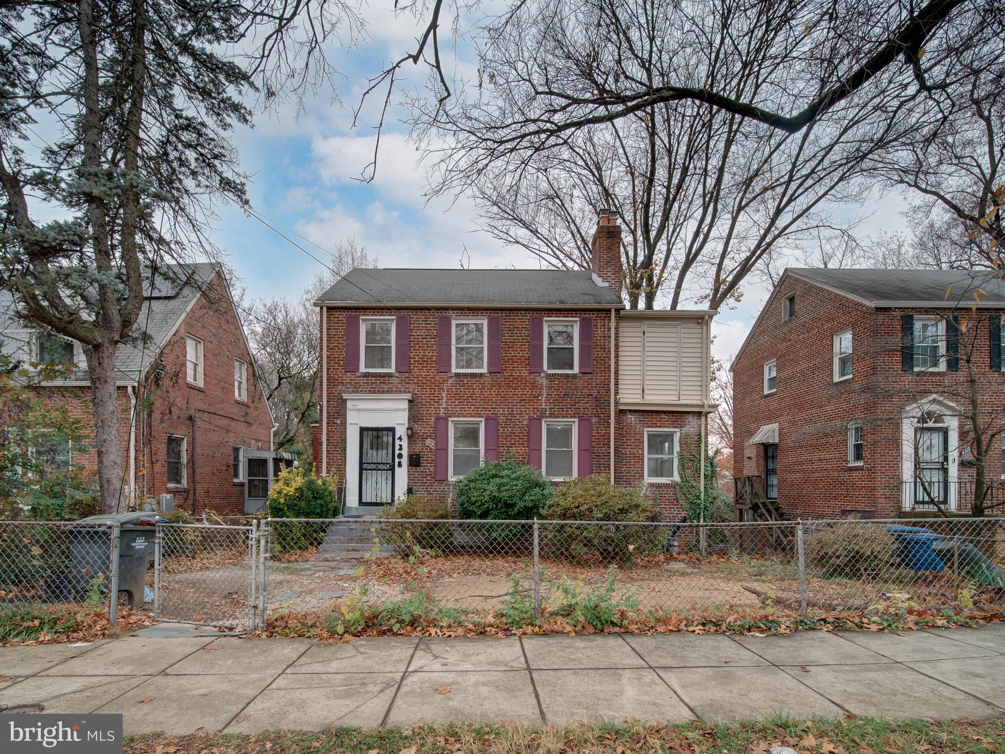 4308 Alabama Avenue Southeast Washington, DC 20019 - Photo 10 of 47 a front view of a house with garden