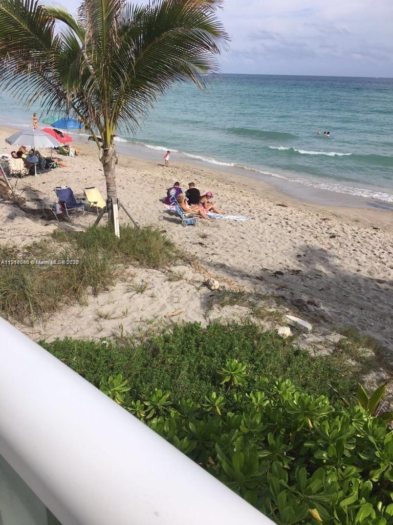 2030 South Ocean Drive, Unit 1815 Hallandale Beach, FL 33009 - Photo 18 of 20 a view of a backyard of the house