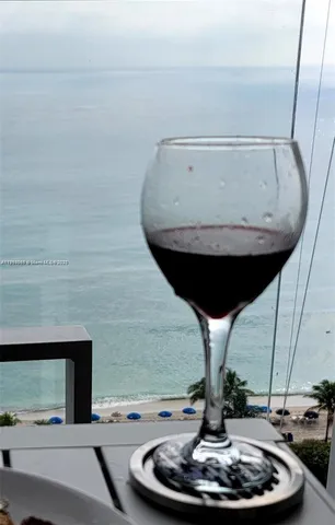 a room with a table and chairs