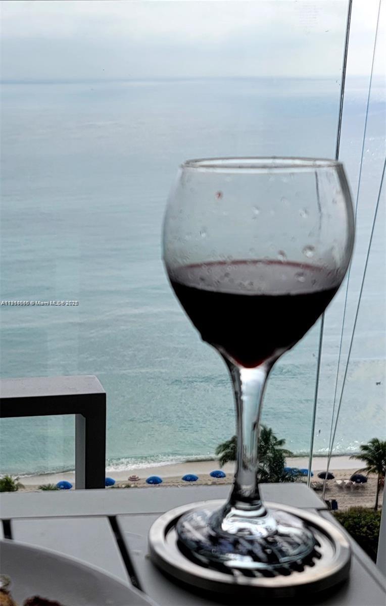 2030 South Ocean Drive, Unit 1815 Hallandale Beach, FL 33009 - Photo 2 of 20 a room with a table and chairs