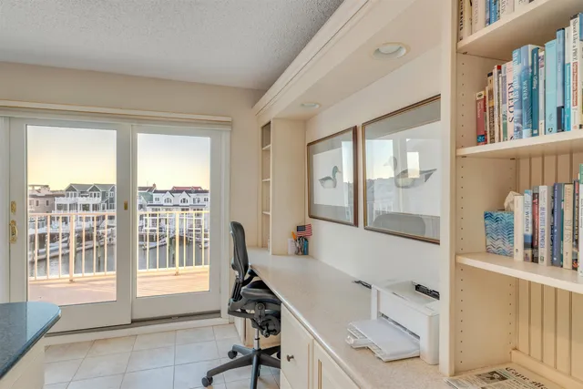 a workspace with furniture and a window