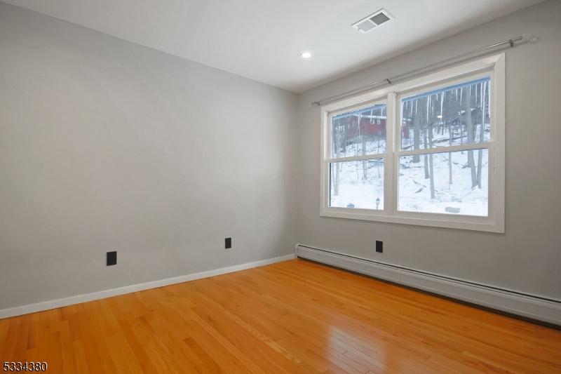 519 East Shore Trail Sparta, NJ 07871 - Photo 12 of 22 a view of an empty room with a window