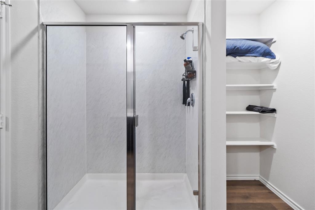 103 Mapleoak Drive Caddo Mills, TX 75135 - Photo 26 of 31 a bathroom with a shower