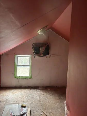 a view of a livingroom with a staircase