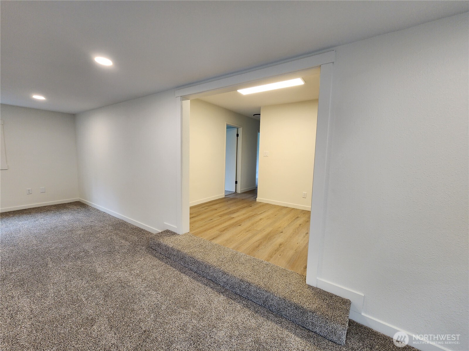 103 Kraft Road Longview, WA 98632 - Photo 4 of 19 a view of hallway with wooden floor
