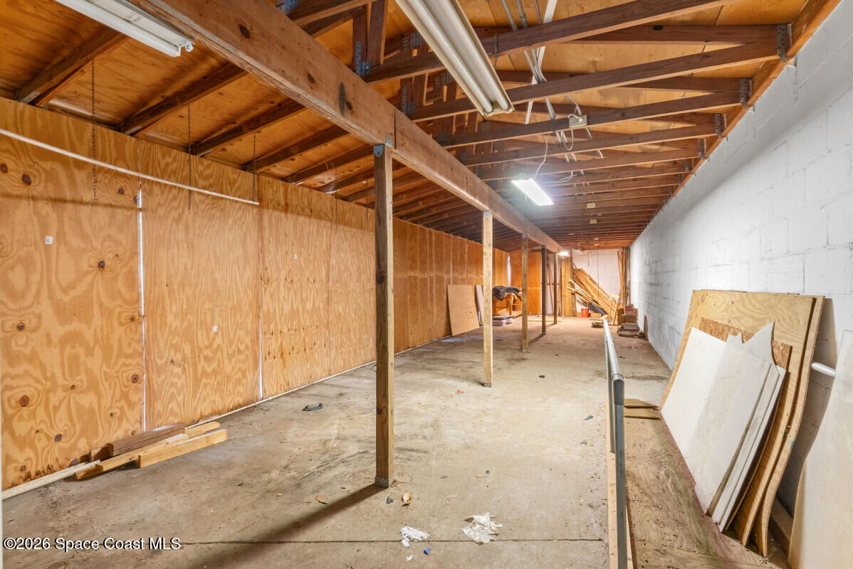 2493 Adamson Road Cocoa, FL 32926 - Photo 16 of 46 a view of a room with wooden floor