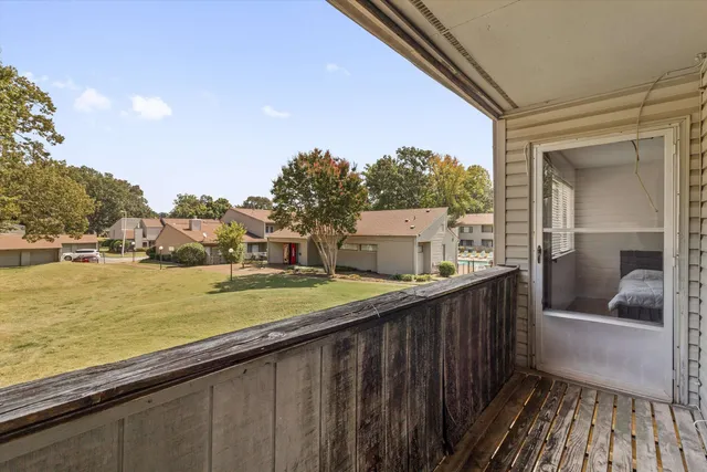 a view of a swimming pool with a lounge chair