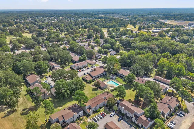 an aerial view of a city with lots of residential buildings
