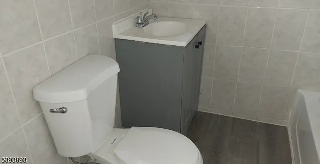 a bathroom with a sink and toilet