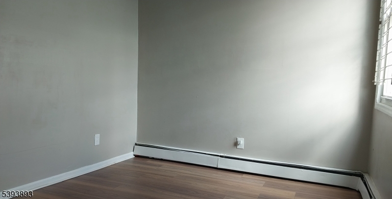 169 Mt Prospect Avenue Newark, NJ 07104 - Photo 9 of 16 a view of an empty room