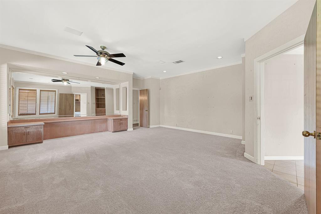 933 Mobley Road Cedar Hill, TX 75104 - Photo 15 of 40 Primary bedroom with built in king size bed headboard.