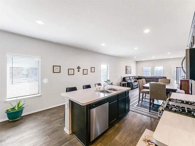 2406 High Spruce Circle Spring, TX 77373 - Photo 12 of 32 a view of a dining room with furniture window and wooden floor