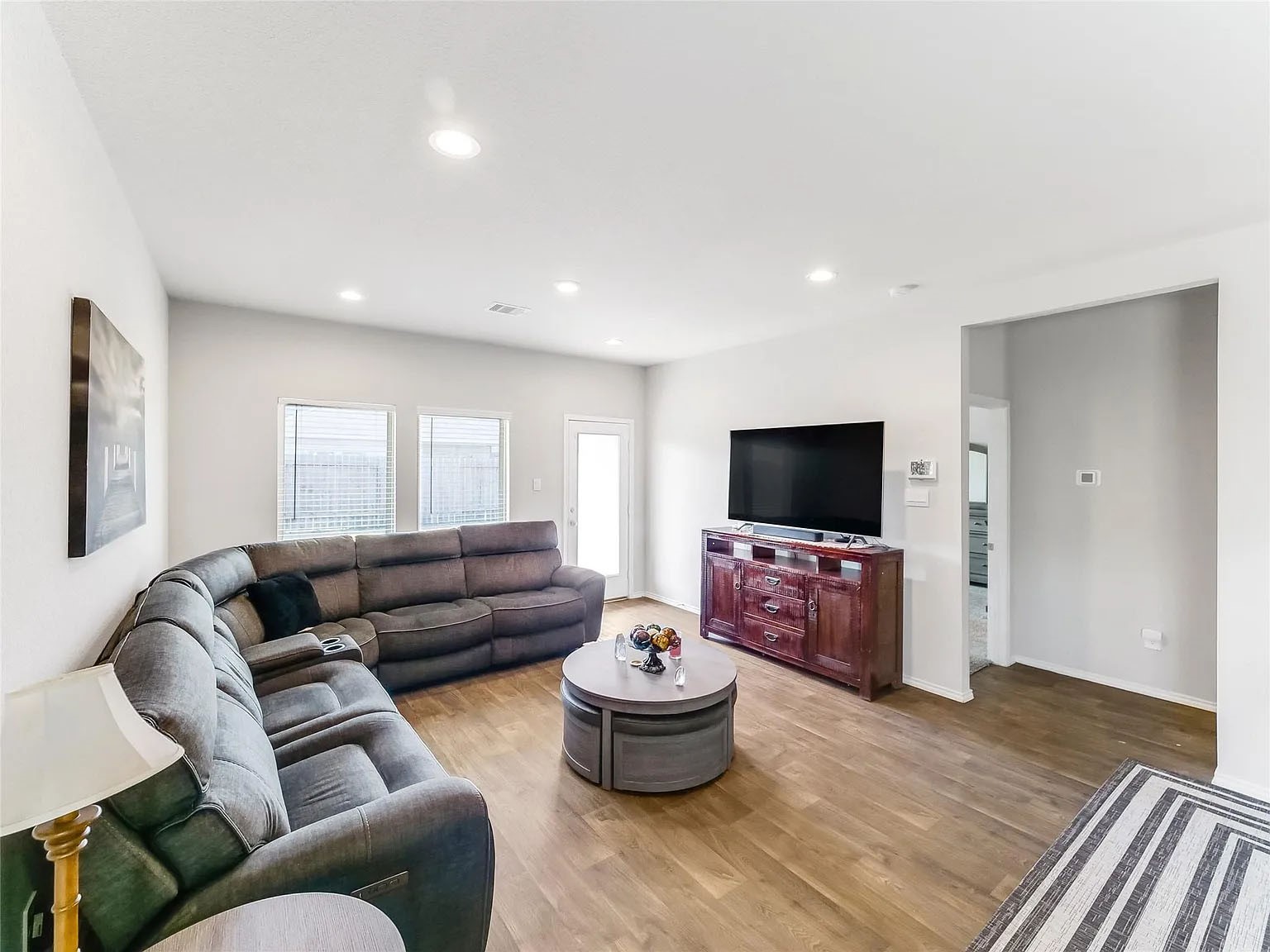 2406 High Spruce Circle Spring, TX 77373 - Photo 15 of 32 a living room with furniture and a flat screen tv