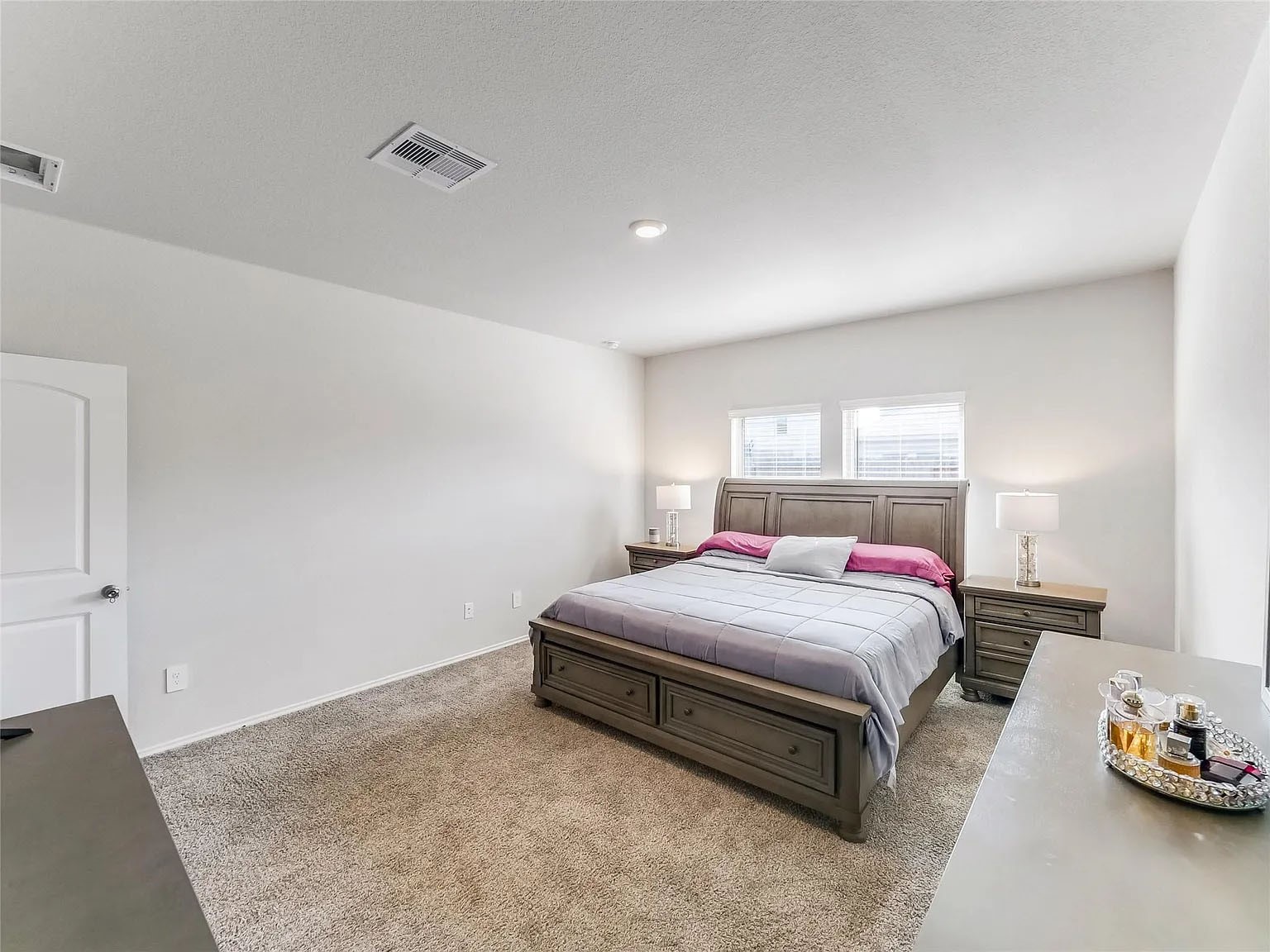 2406 High Spruce Circle Spring, TX 77373 - Photo 17 of 32 a bedroom with a bed and a window