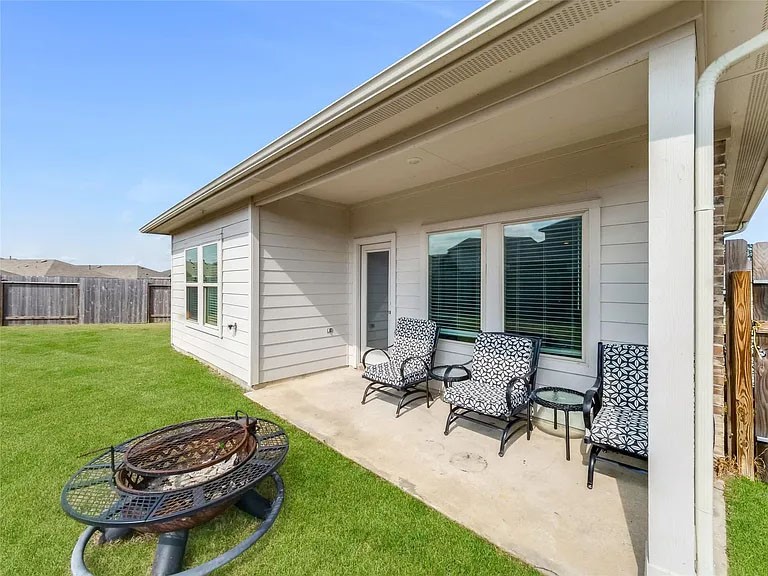 2406 High Spruce Circle Spring, TX 77373 - Photo 28 of 32 a view of a backyard with sitting area and chairs
