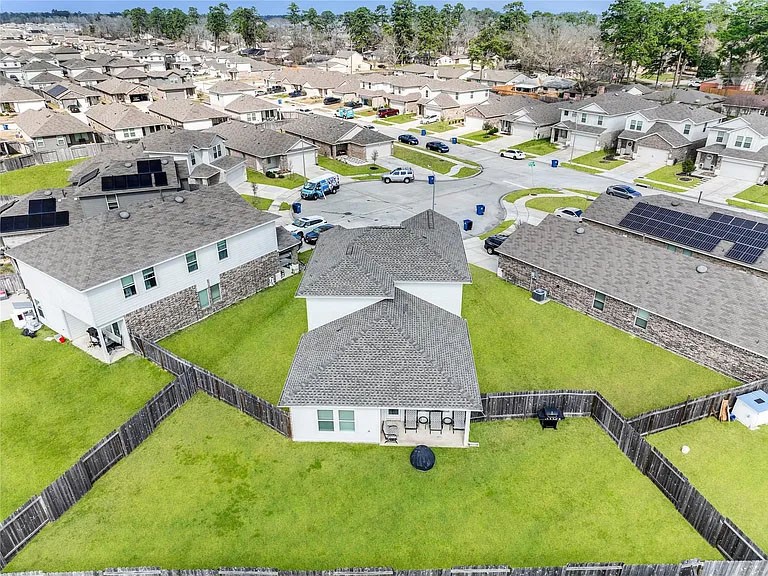 2406 High Spruce Circle Spring, TX 77373 - Photo 30 of 32 swimming pool view with a lounge chairs