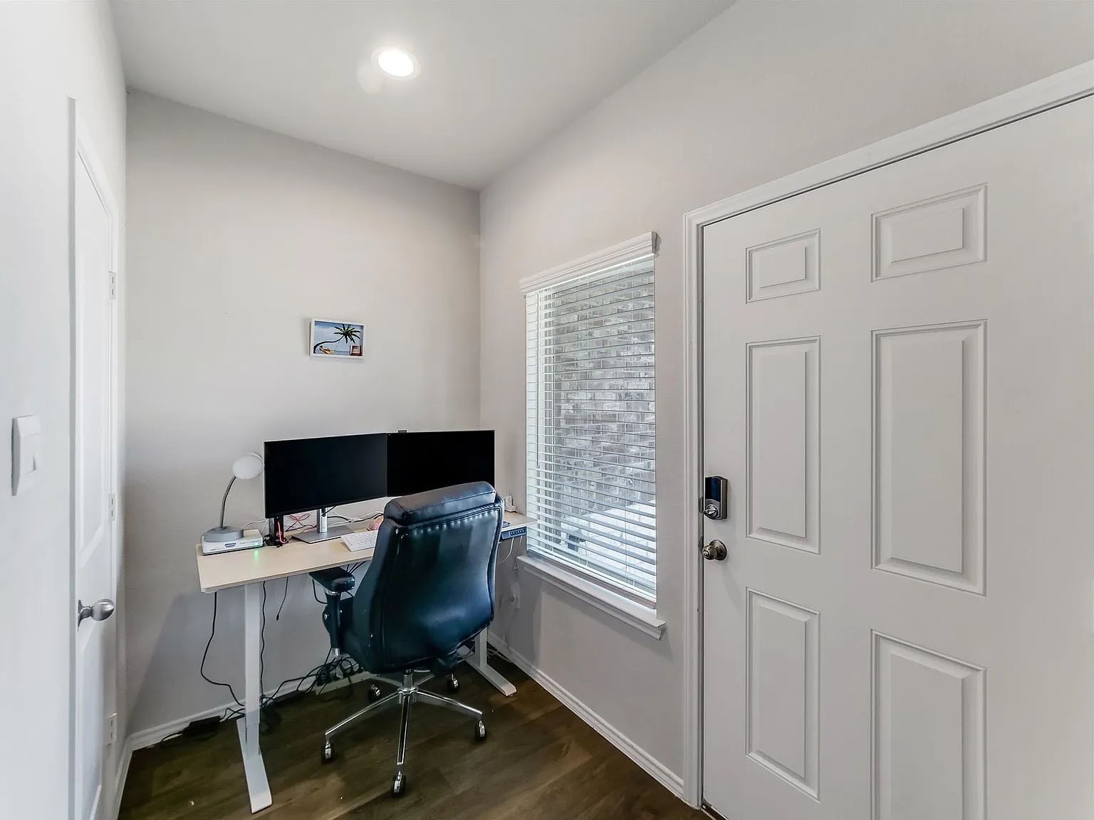 2406 High Spruce Circle Spring, TX 77373 - Photo 3 of 32 a view of a workspace with furniture and wooden floor