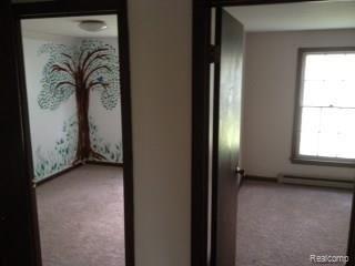 1310 East Wilson Road Clio, MI 48420 - Photo 9 of 15 Wilson bedroom 3 and 4.jpg
