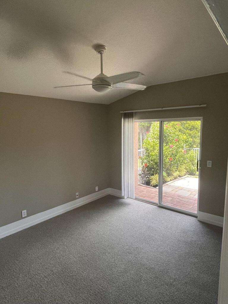 1107 Via Jardin Riviera Beach, FL 33418 - Photo 12 of 21 a view of an empty room with a window