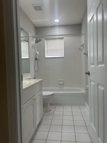 a view of kitchen and windows