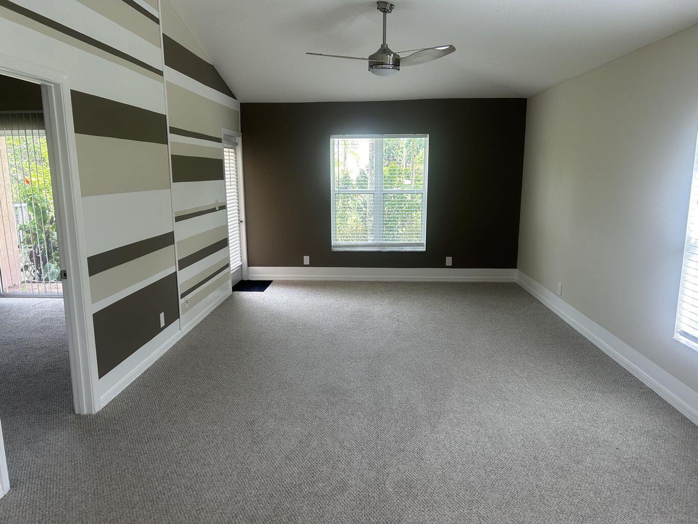 1107 Via Jardin Riviera Beach, FL 33418 - Photo 4 of 21 a view of an empty room with a window