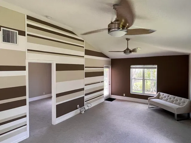 a bathroom with a shower and a toilet