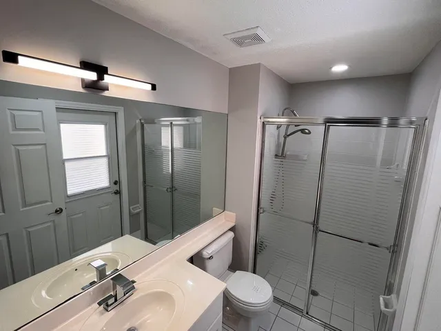 a view of a room that has a large window