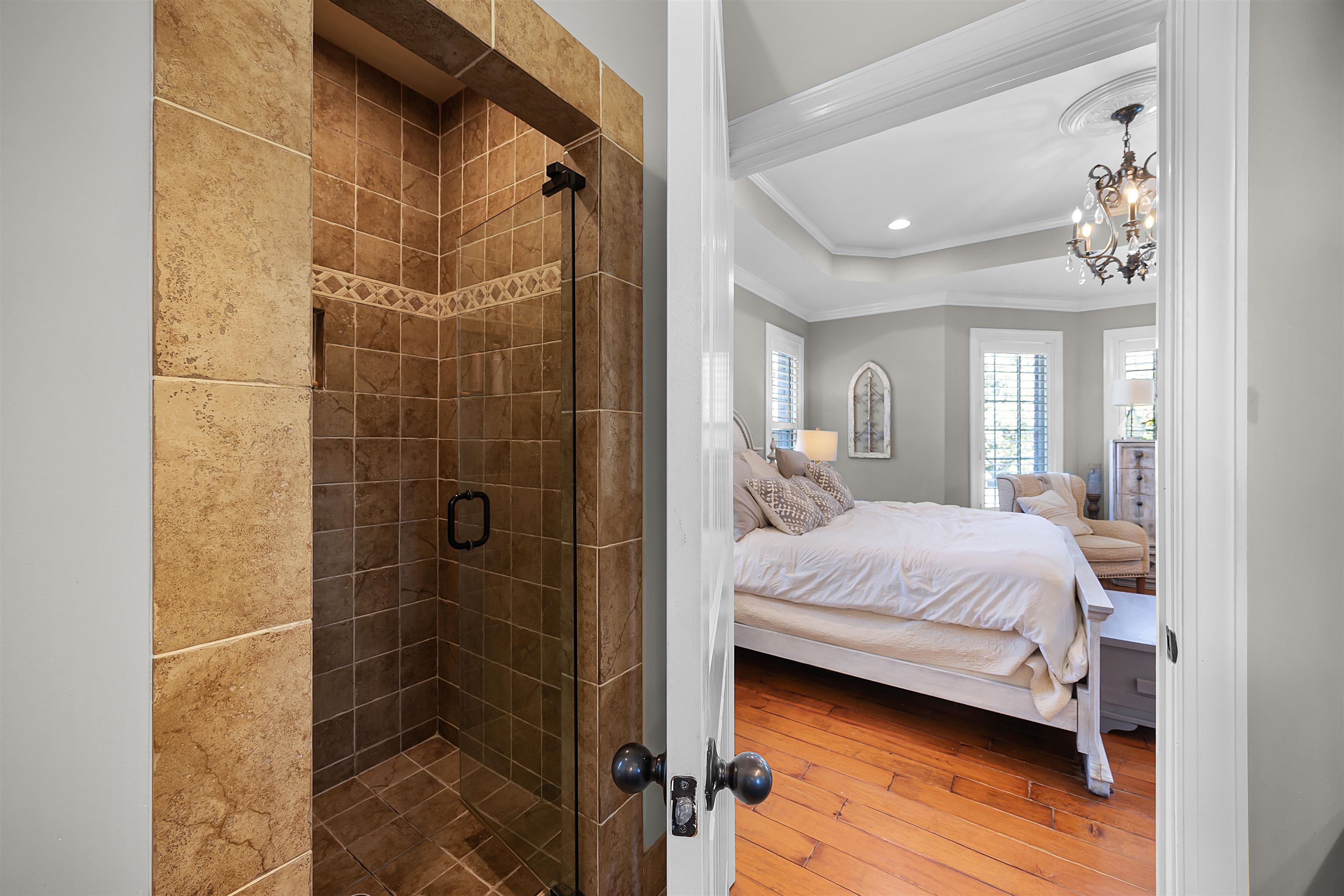140 Legends Drive Counce, TN 38326 - Photo 19 of 30 Bedroom with ornamental molding, recessed lighting, and wood finished floors