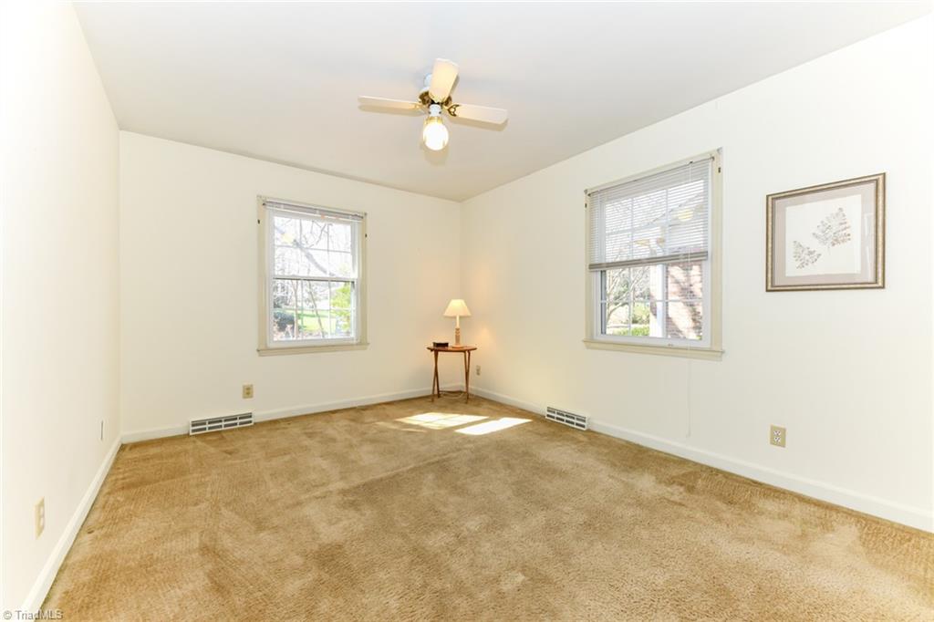 2006 Red Forest Road Greensboro, NC 27410 - Photo 22 of 46 3rd bedroom on main level - hardwood under carpet