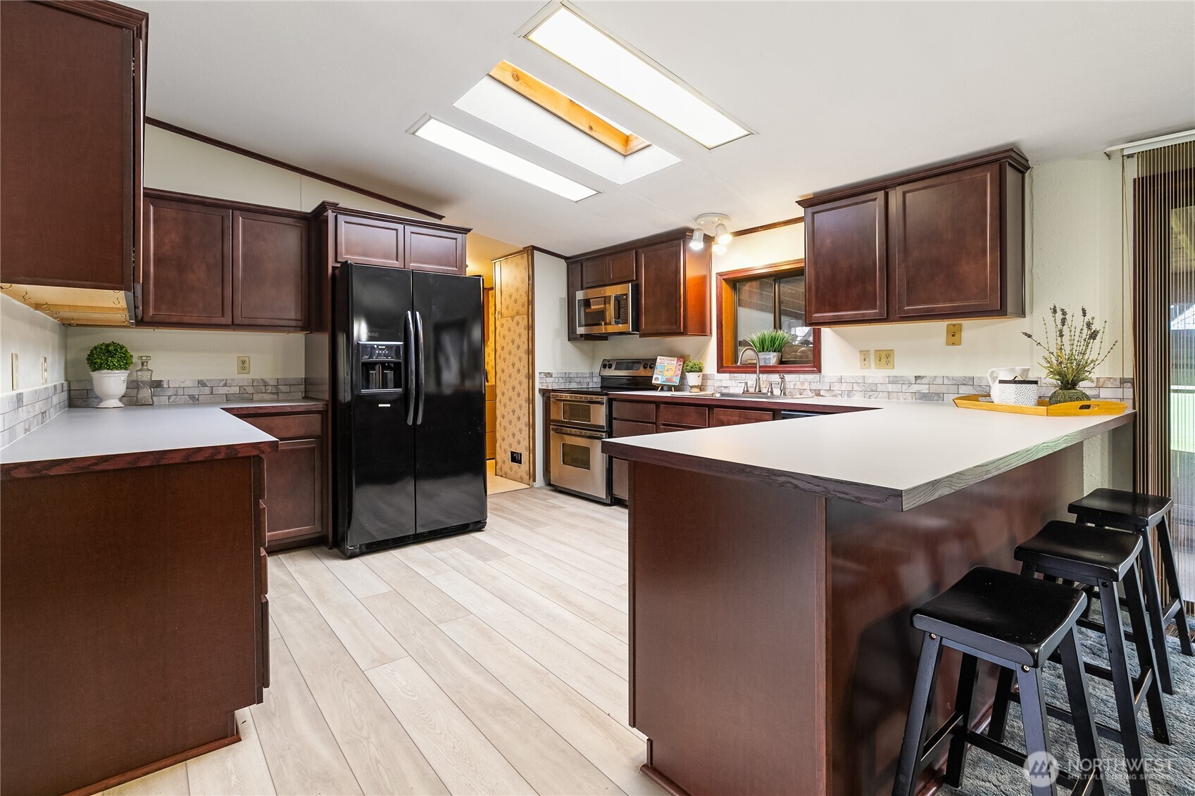 3191 Creasey Road Custer, WA 98240 - Photo 6 of 36 a kitchen with a sink appliances and cabinets