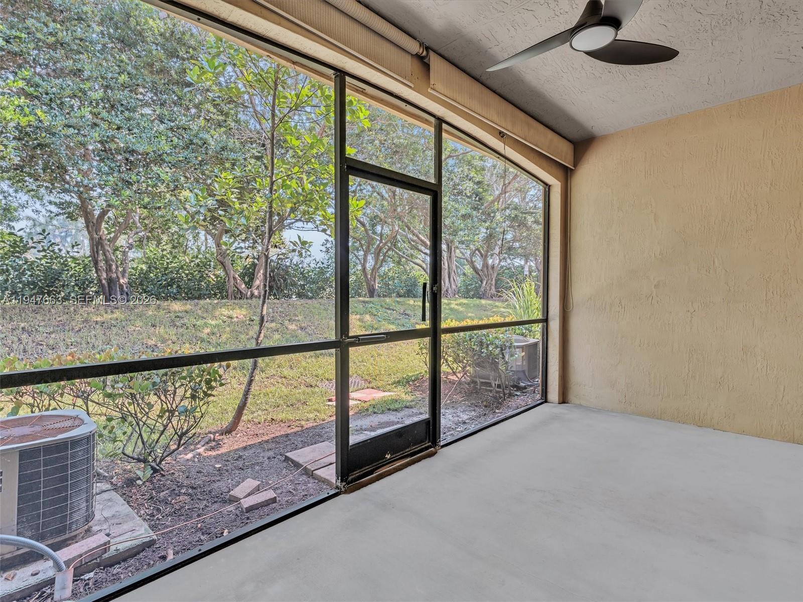 3853 Tree Top Drive, Unit 3853 Weston, FL 33332 - Photo 19 of 43 a view of a balcony with lake view