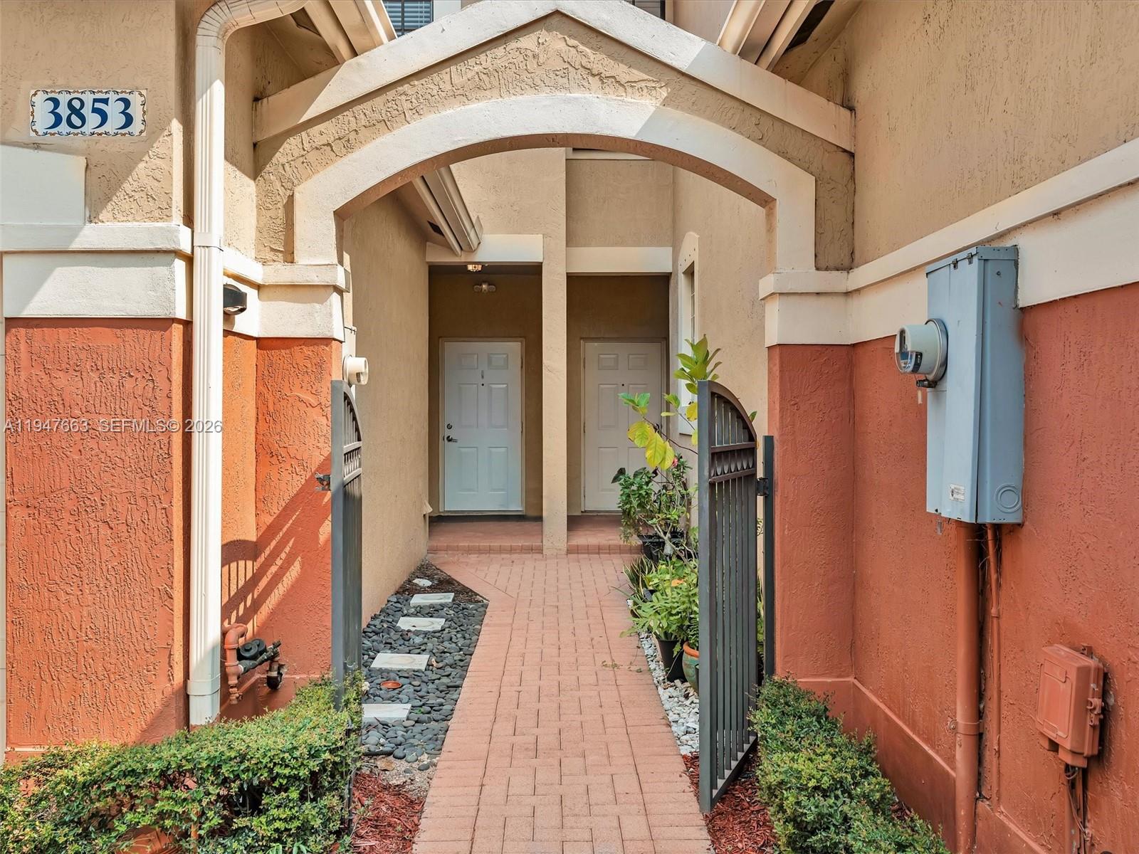 3853 Tree Top Drive, Unit 3853 Weston, FL 33332 - Photo 2 of 43 a view of a house with a street
