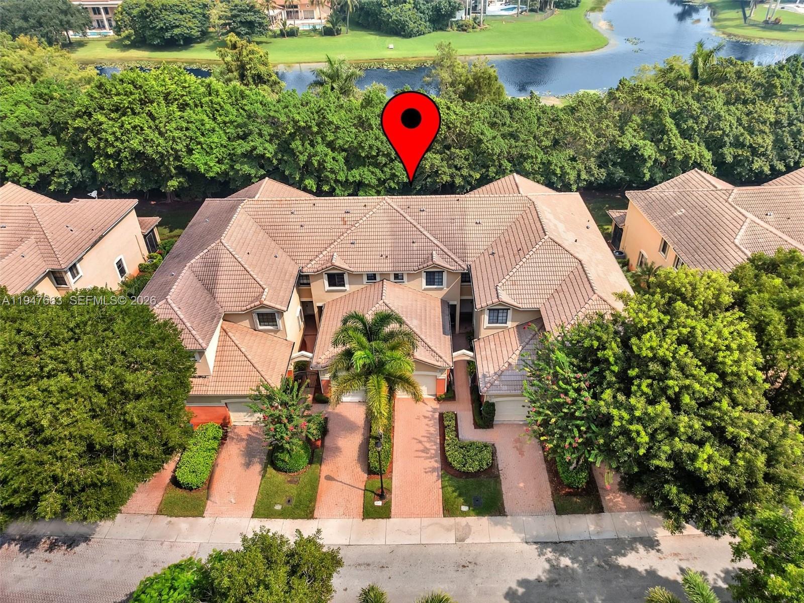 3853 Tree Top Drive, Unit 3853 Weston, FL 33332 - Photo 36 of 43 an aerial view of a house