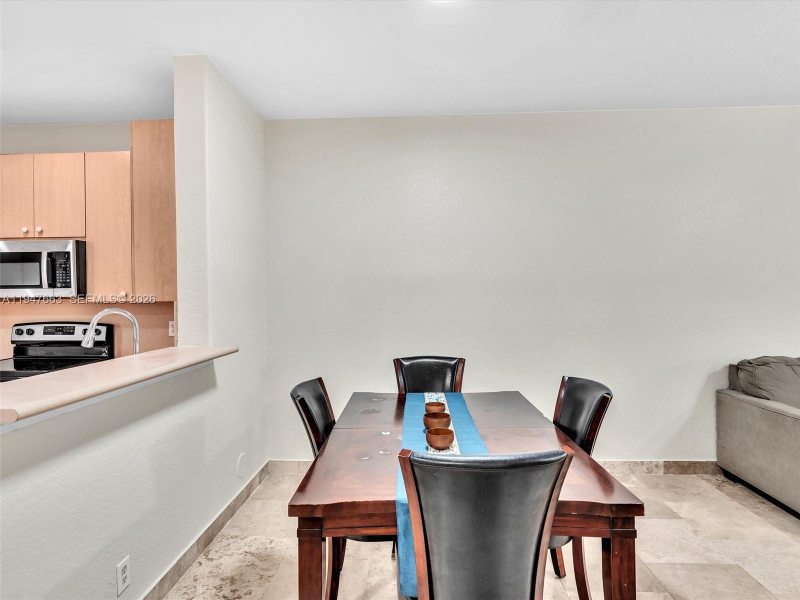 3853 Tree Top Drive, Unit 3853 Weston, FL 33332 - Photo 10 of 43 a workspace with furniture and window