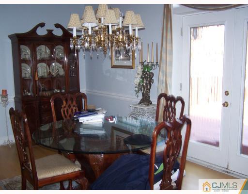 115 Westley Road Old Bridge, NJ 08857 - Photo 5 of 10 a view of a dining room with furniture