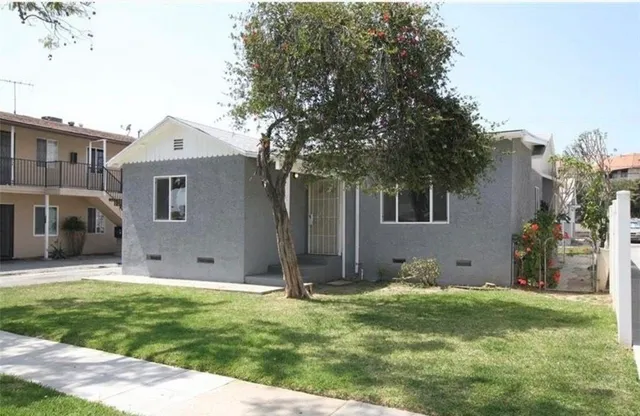 a front view of house with yard