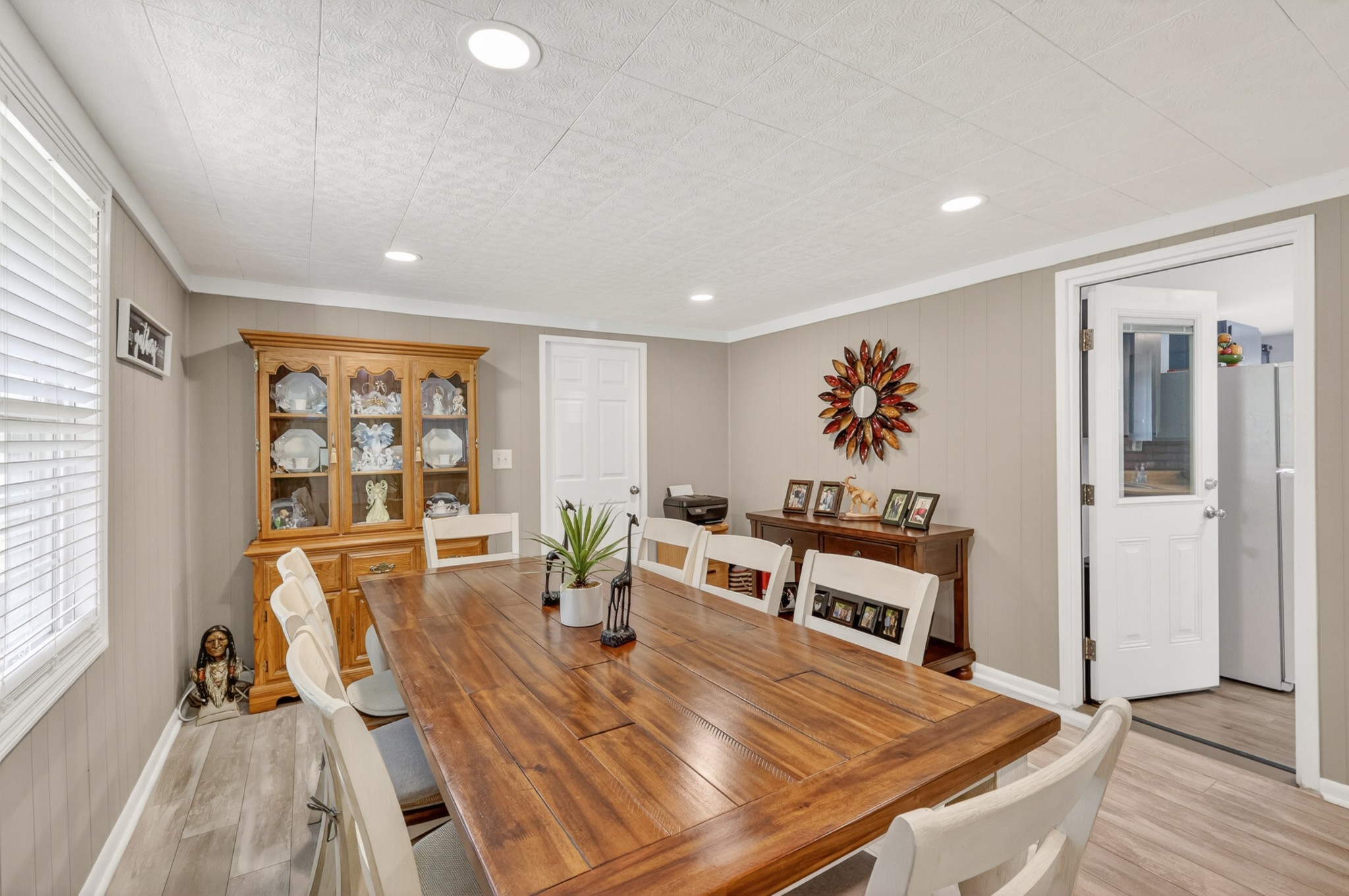 233 Rucker Road Murfreesboro, TN 37127 - Photo 11 of 43 a view of a dining room with furniture a chandelier and wooden floor