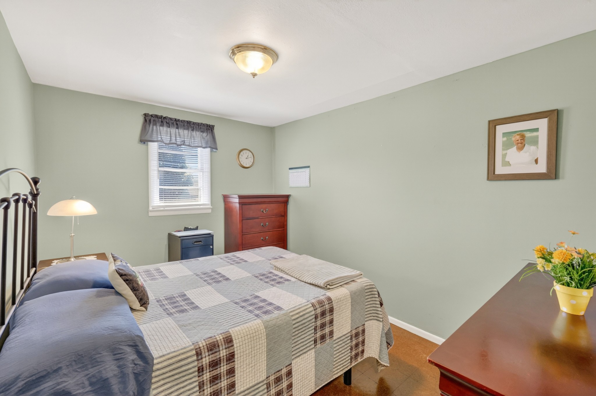 233 Rucker Road Murfreesboro, TN 37127 - Photo 20 of 43 a bedroom with a bed and a potted plant