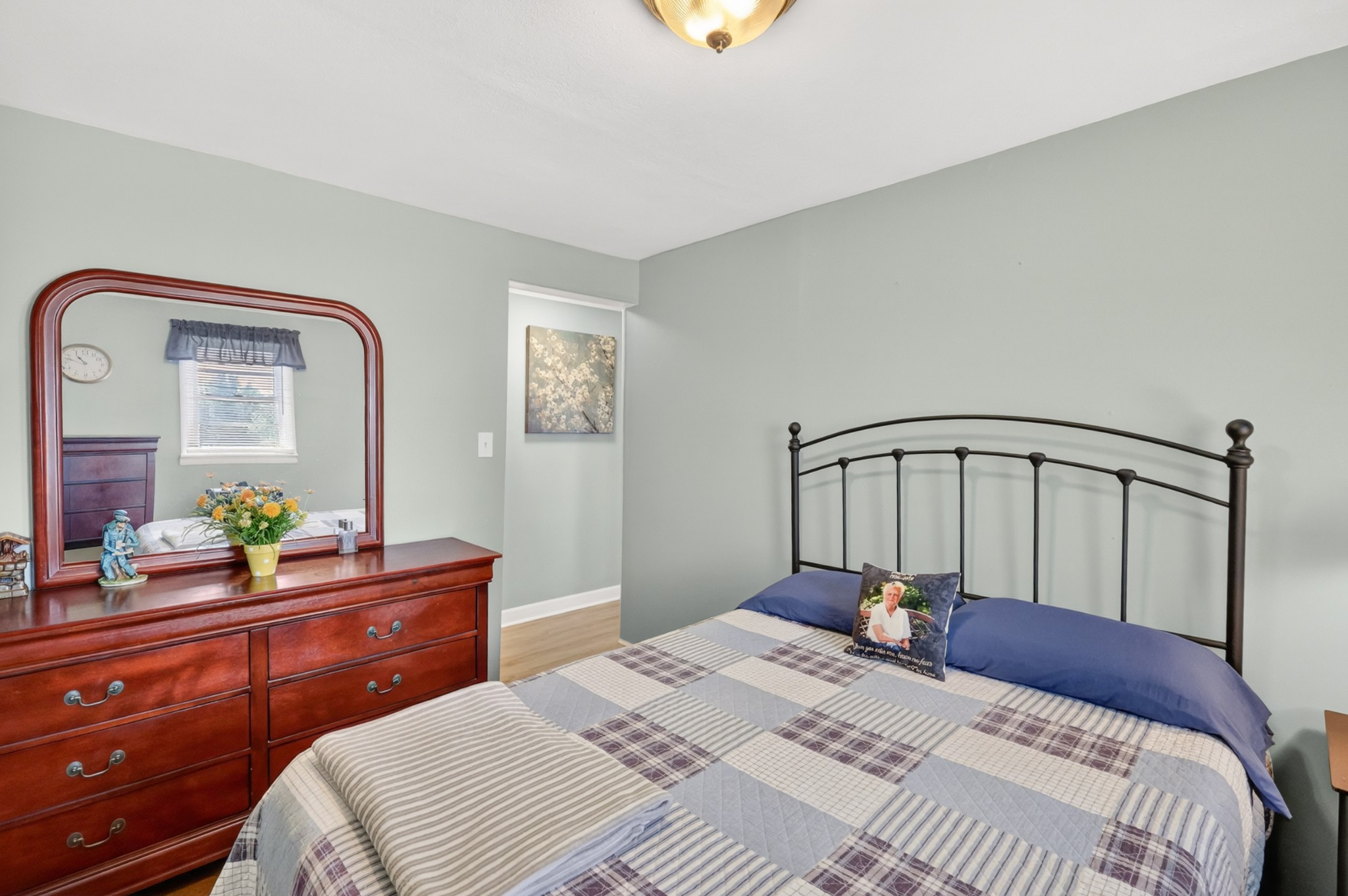 233 Rucker Road Murfreesboro, TN 37127 - Photo 21 of 43 a bedroom with a bed and a mirror on dresser