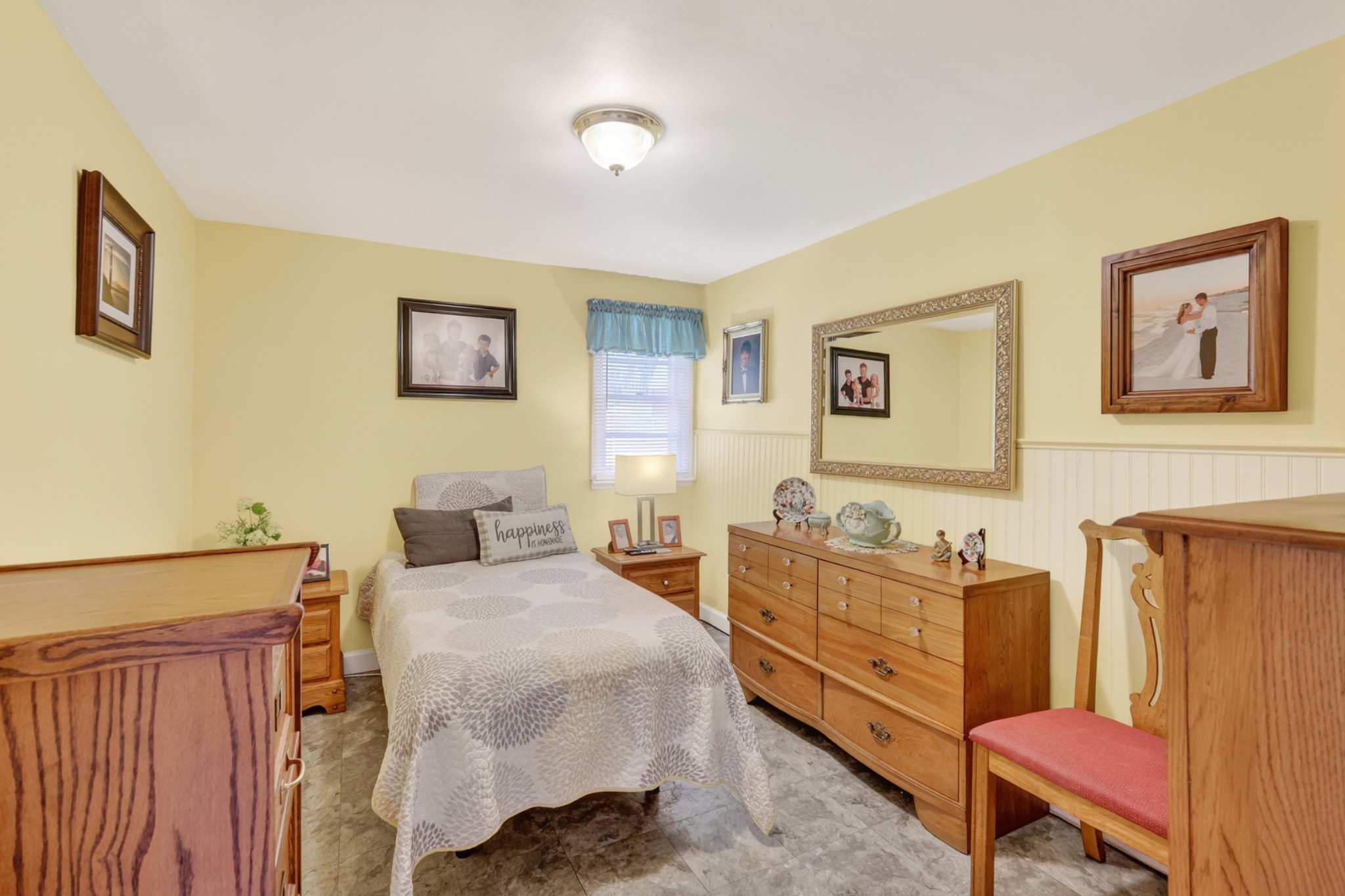 233 Rucker Road Murfreesboro, TN 37127 - Photo 22 of 43 a bedroom with a bed and wooden floor