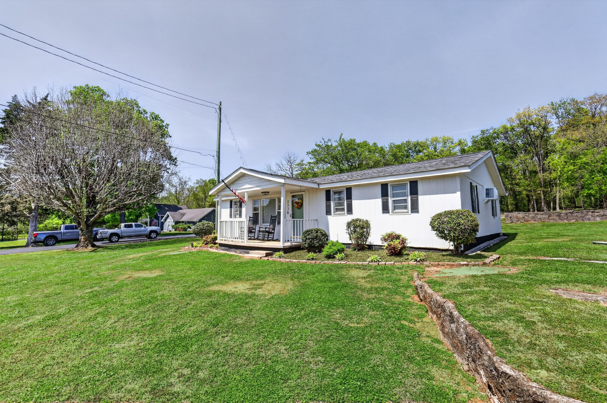 233 Rucker Road Murfreesboro, TN 37127 - Photo 3 of 43 a front view of house with a garden and trees