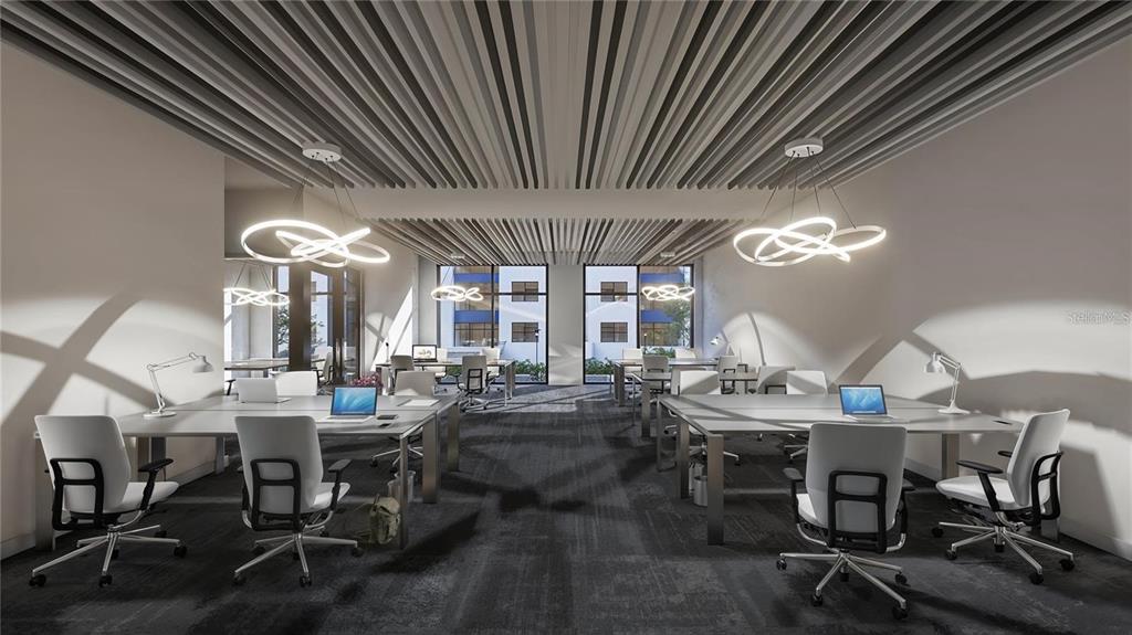 3101 Old Archer Road, Unit PH1601 Gainesville, FL 32608 - Photo 5 of 9 a view of a dining room with furniture wooden floor and chandelier