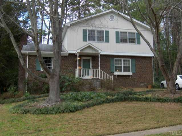 3300 Cobblestone Court Raleigh, NC 27607 - Photo 1 of 1 a front view of a house with garden